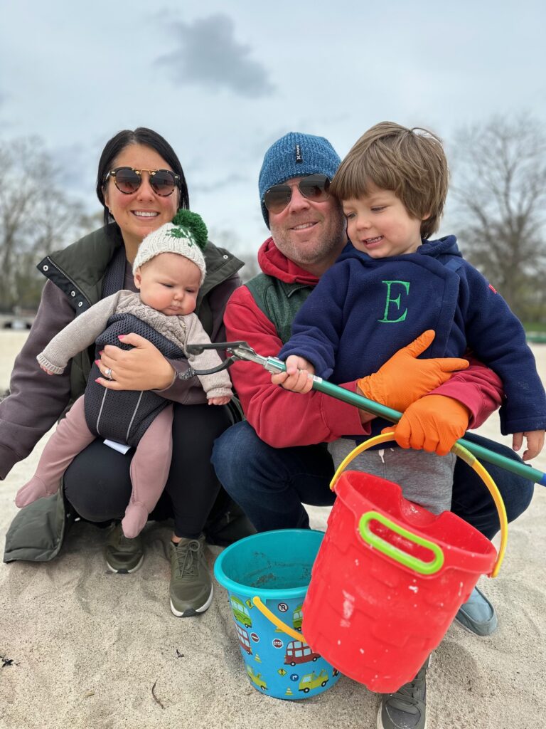 (PHOTO: Jaime and Todd Ulrich and their kids at the Rye Town Park Oakland Beach cleanup on Sunday, April 21, 2024.)