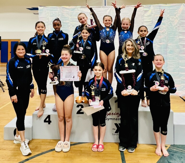 (PHOTO: The 2024 Rye YMCA gymnastics team Silver XL Champions: Back row left to right: Julia Brown, Alexia Chawana, Annabella Velozo, Ellie Louis, Azie Patterson, Valeria Ramos. Middle row Juliet Juliette Llamas. First row Coach Melissa Lewis, Hope Thomas, Elle Niejadlik, Coach Shelly Schettino, Lua Jankovsky.)