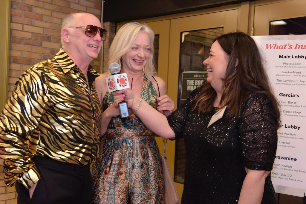 (PHOTO: Paula Fung from Rye TV interviewing Kirk and Laura Bret on the red carpet as they arrive at The Capitol Theatre for The Rye Arts Center's Studio 51 Spring Benefit.)