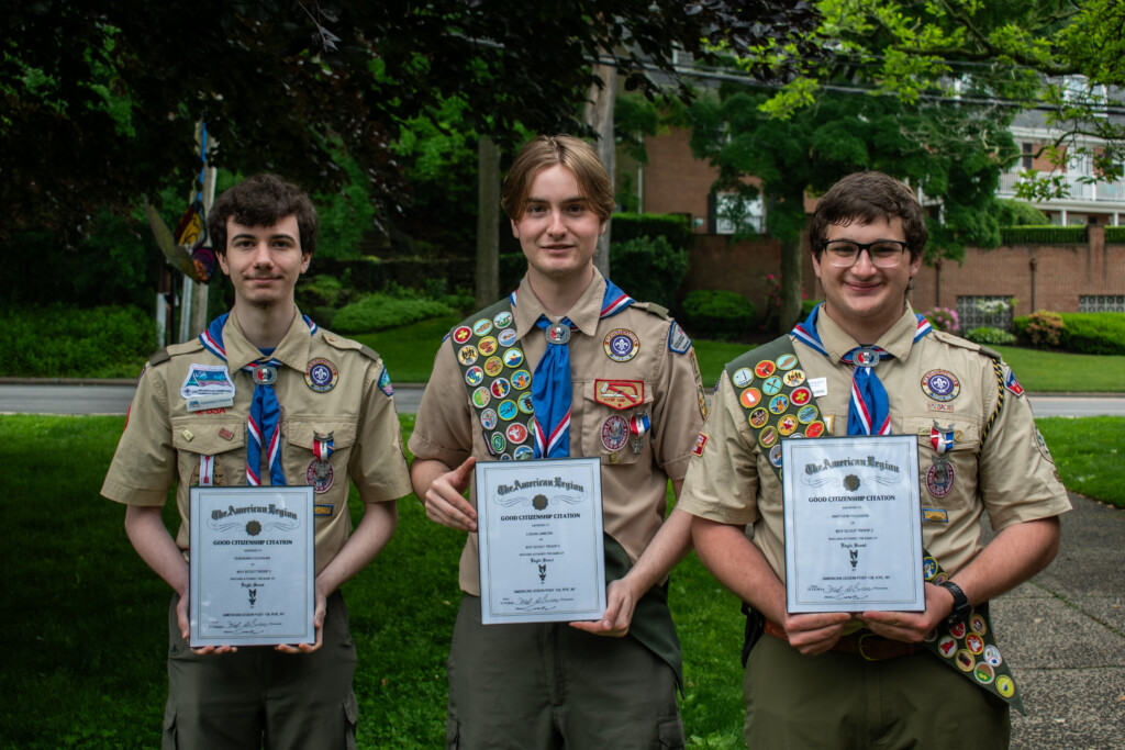 (PHOTO: (L to R) Ferdinand Coughlin, Logan Jancski, and Matthew Pellegrini all earned the  Eagle Scout Award on Monday, May 27, 2024. Credit: Tilman Oberbannscheidt.)