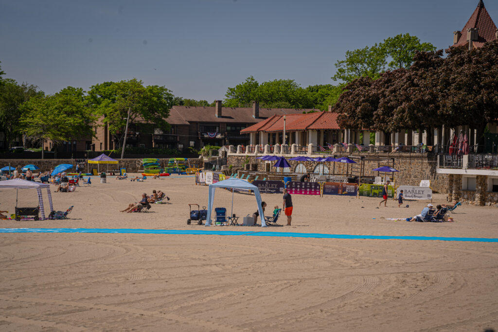 (PHOTO: Rye Town Park's Oakland Beach Saturday morning, May 25, 2024. The beach's bright blue access mat is viewable in the foreground. Credit: Justin Gray.)