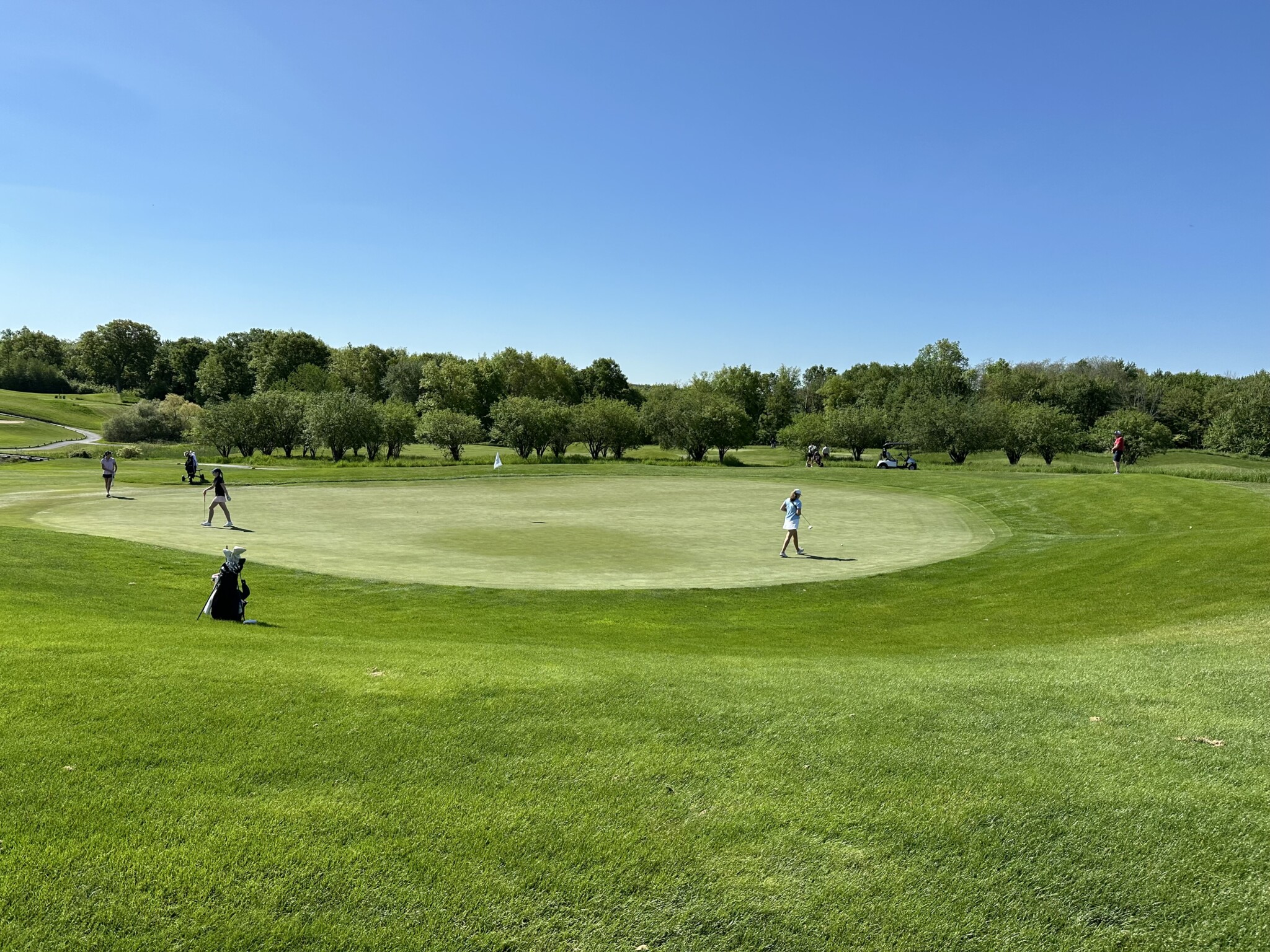 (PHOTO: Girls Varsity Golf clinches third place in Section 1 thanks to a strong showing on Monday.)