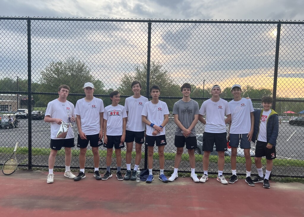 (PHOTO: Most of the Rye Boys Varsity Tennis team on Monday after clinching the win at 4th doubles.)