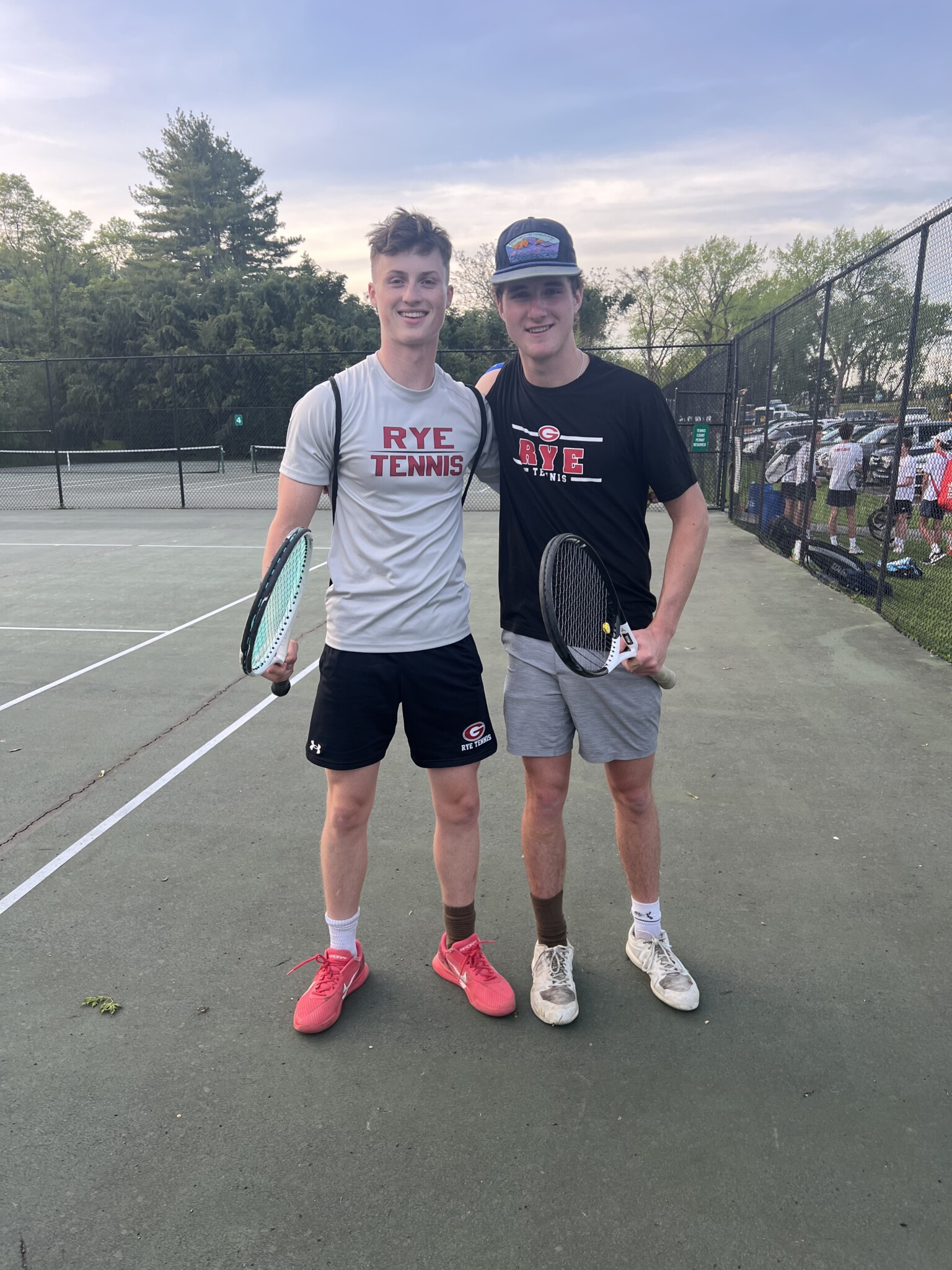 (PHOTO: The Rye Boys Varsity Tennis team third doubles team, Henry Paul and Henry Bagley, on Tuesday.)