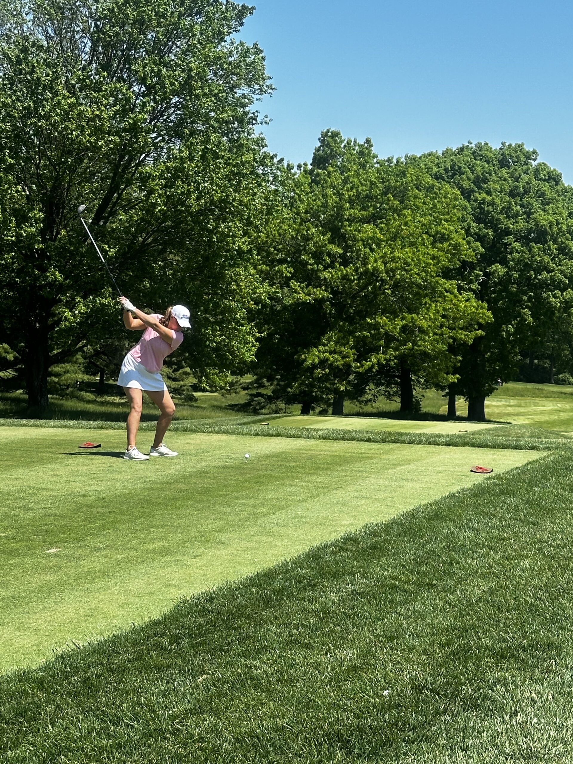 (PHOTO: Myla Bisceglia drives one off the tee at Whippoorwill Country Club.)