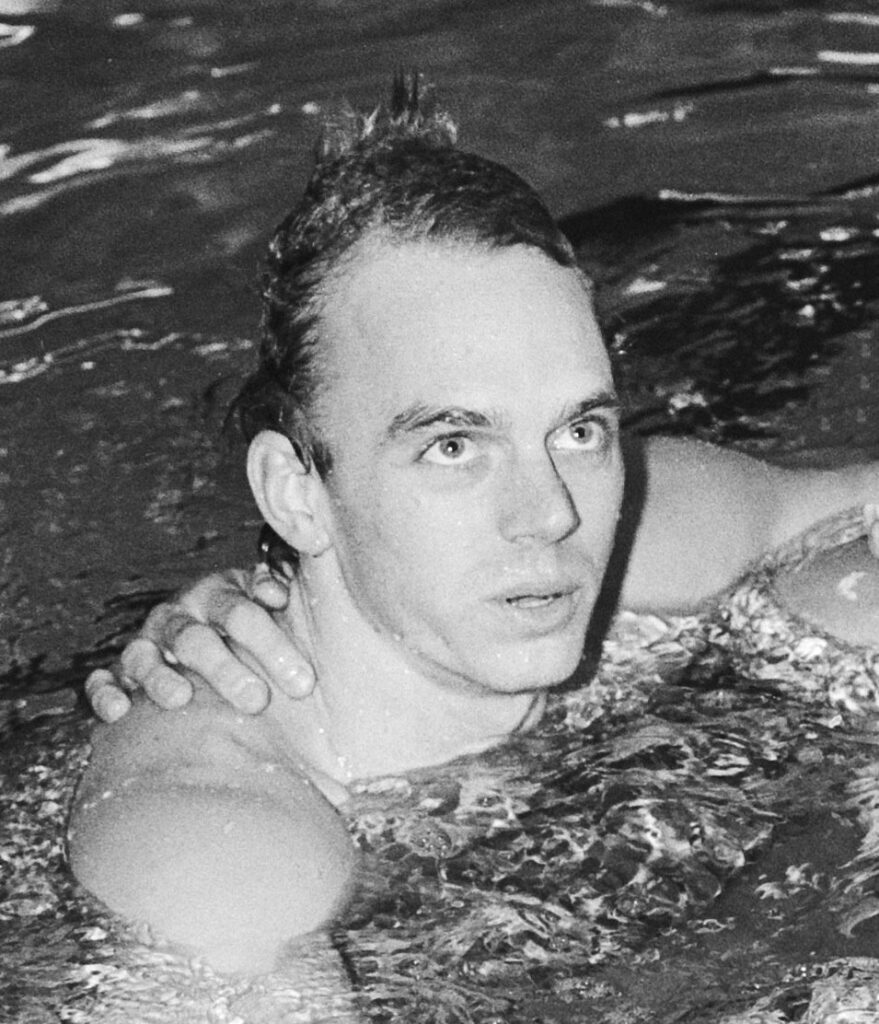 (PHOTO: Olympic gold medalist and world record holder in swimming Rowdy Gaines in 1983. Credit: Croes, Rob C. for Anefo, CC BY-SA 3.0 NL, via Wikimedia Commons.)