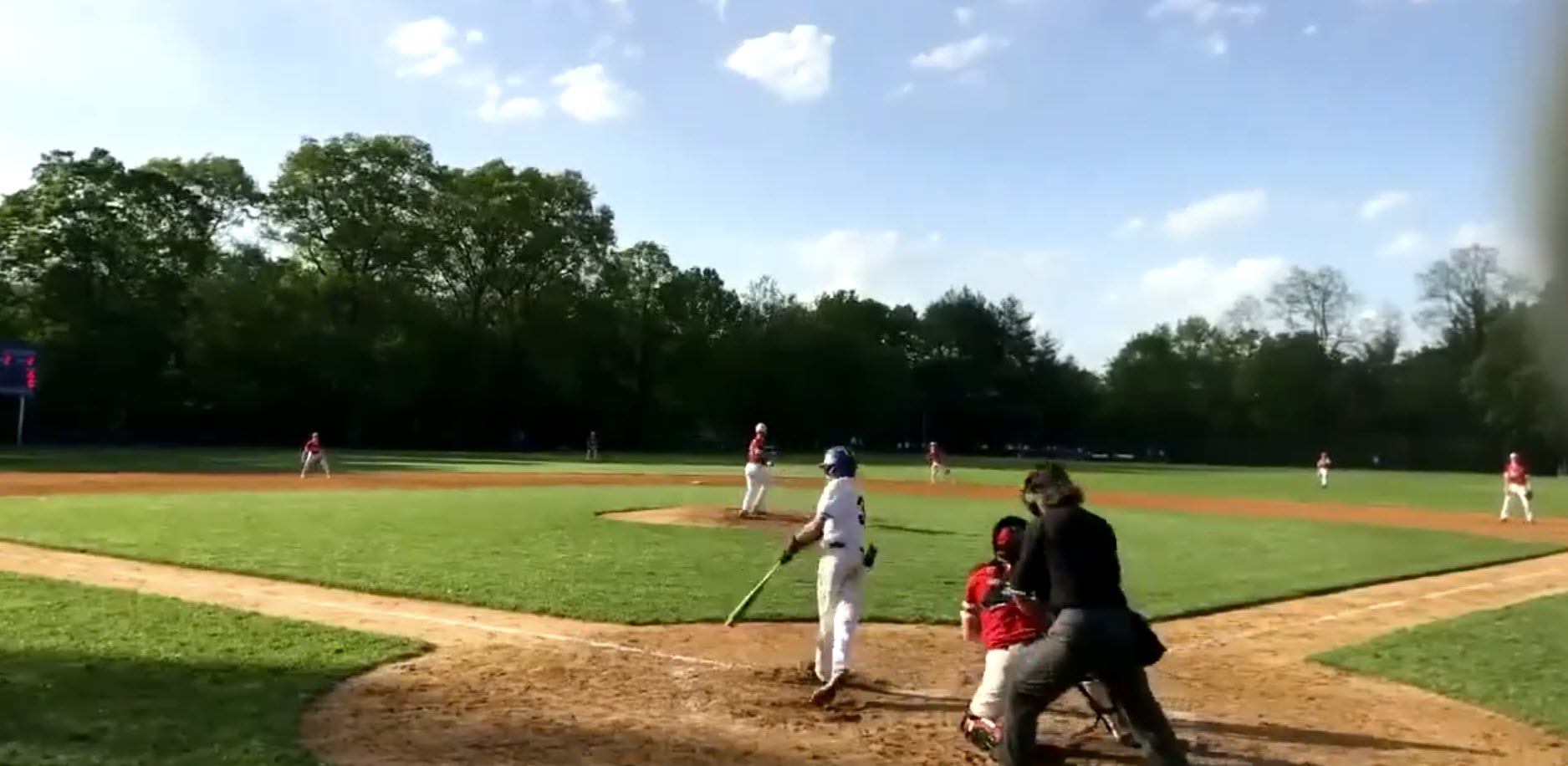 (PHOTO: Rye Boys Varsity Baseball pitcher Peter Davies delivering heat on Wednesday.)