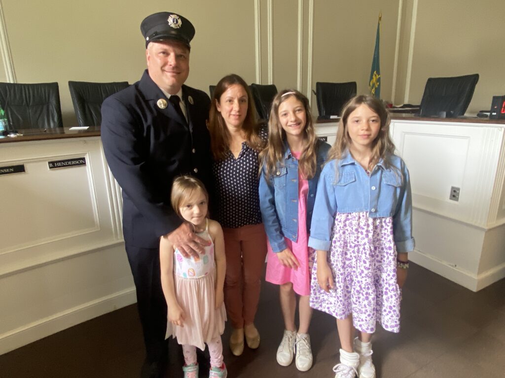 (PHOTO: Rye FD Captain Clyde Pitts with his wife Debbie, and daughters Abigail, Emilie and (in front) Kelsey.)