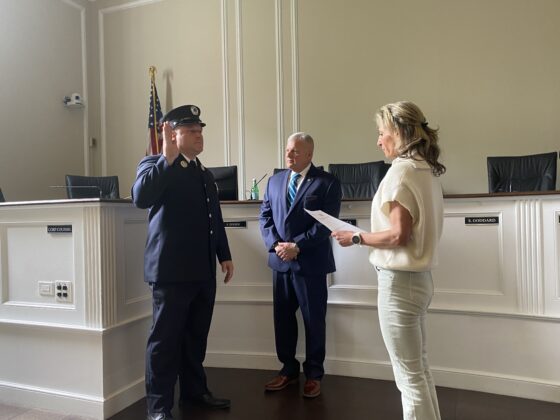 (PHOTO: Rye City Clerk Noga Ruttenberg swears-in Rye FD Captain Clyde Pitts at Rye City Hall on May 3, 2024.)
