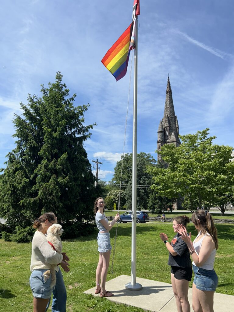 (PHOTO: The Pride flag goes up at Rye High School during the 4th annual Pride flag raising on Friday, May 31, 2024.)