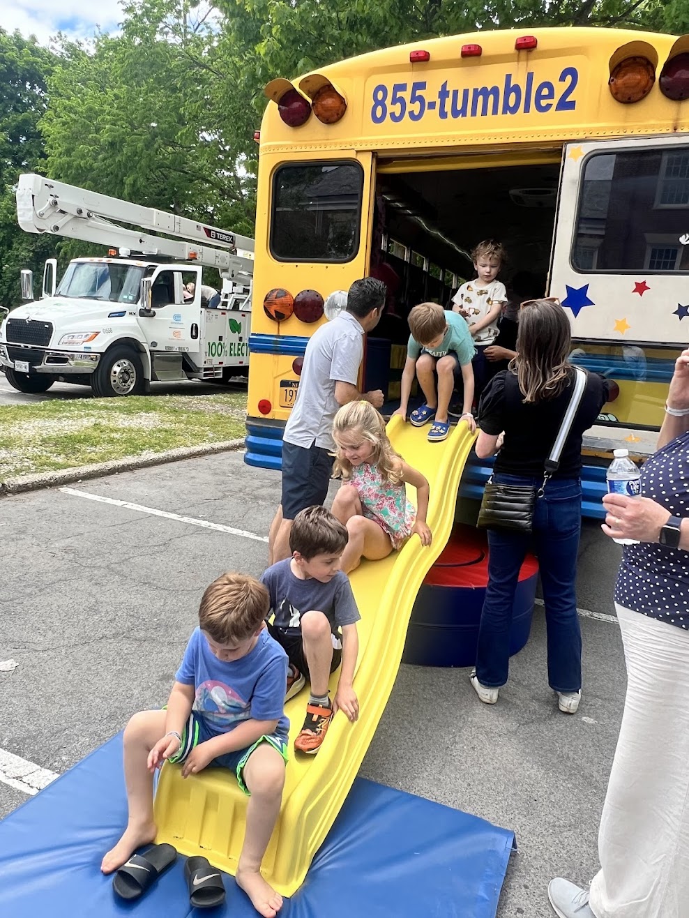 (PHOTO: Only school bus they will ever be on ... The Rye Free Reading Room's annual Vehicle Fair was held on the Rye village green on Sunday, May 19, 2024.)