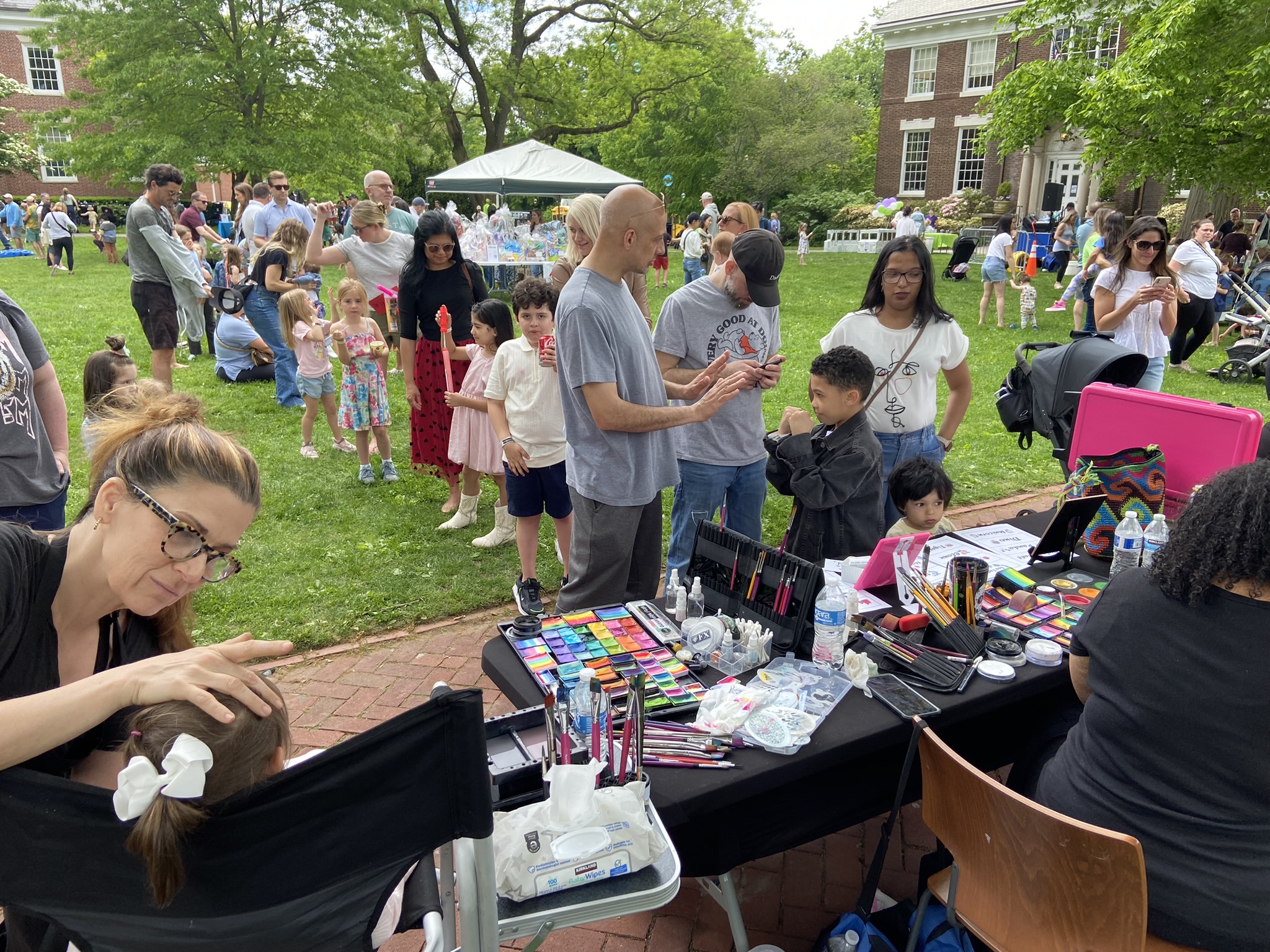 (PHOTO: Face painting at The Rye Free Reading Room's annual Vehicle Fair on Sunday, May 19, 2024.)