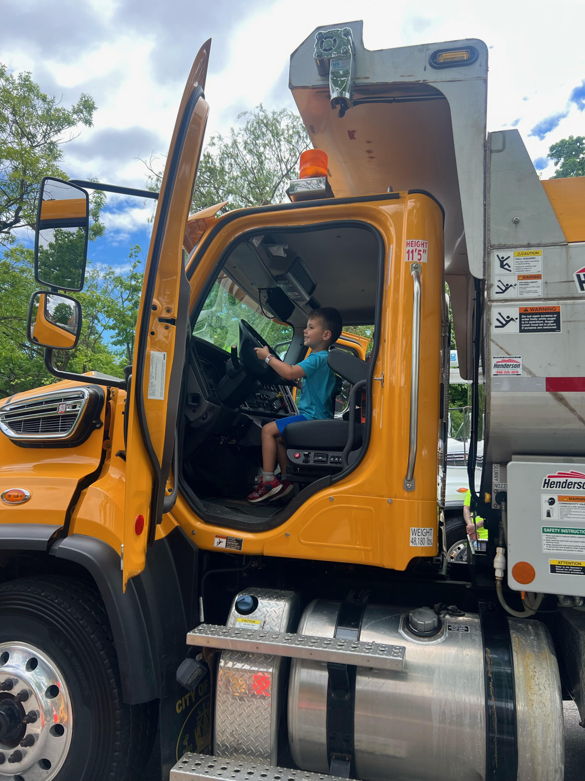 (PHOTO: Future DPW professional. The Rye Free Reading Room's annual Vehicle Fair was held on the Rye village green on Sunday, May 19, 2024.)