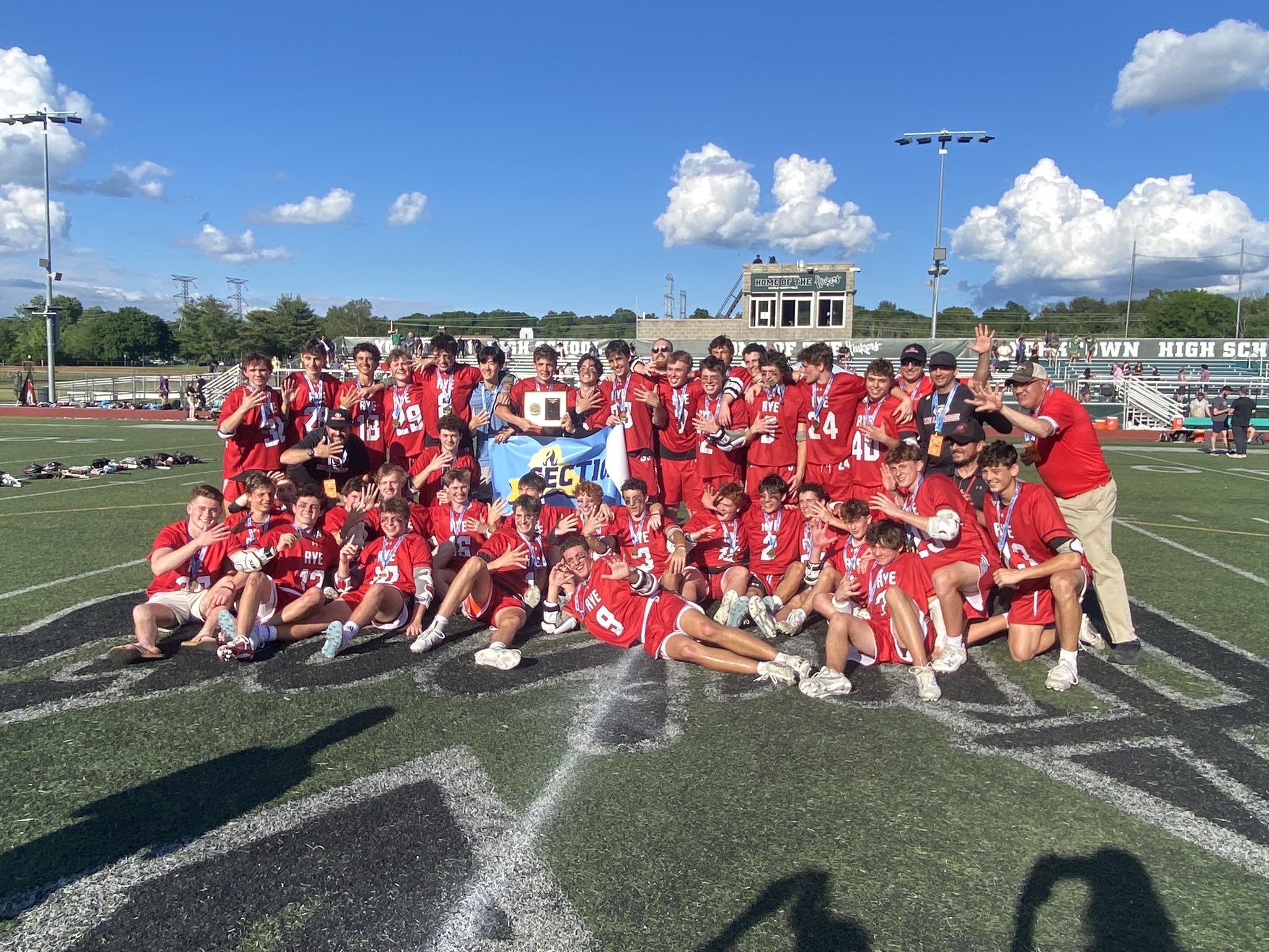 (PHOTO: Rye boys lacrosse celebrates its fifth consecutive Section 1 championship.)