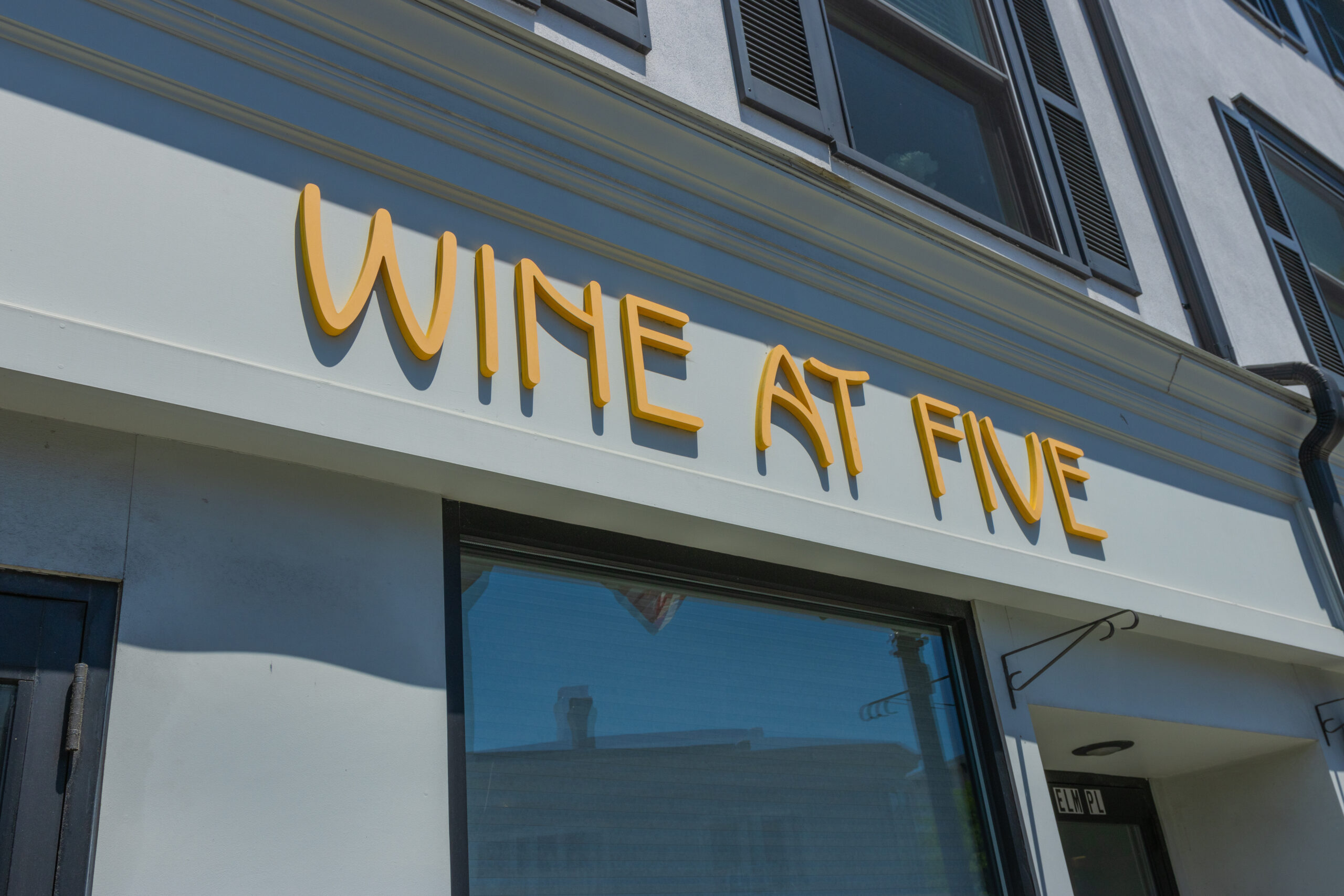 (PHOTO: Wine at Five's storefront at 1 Elm Place.)