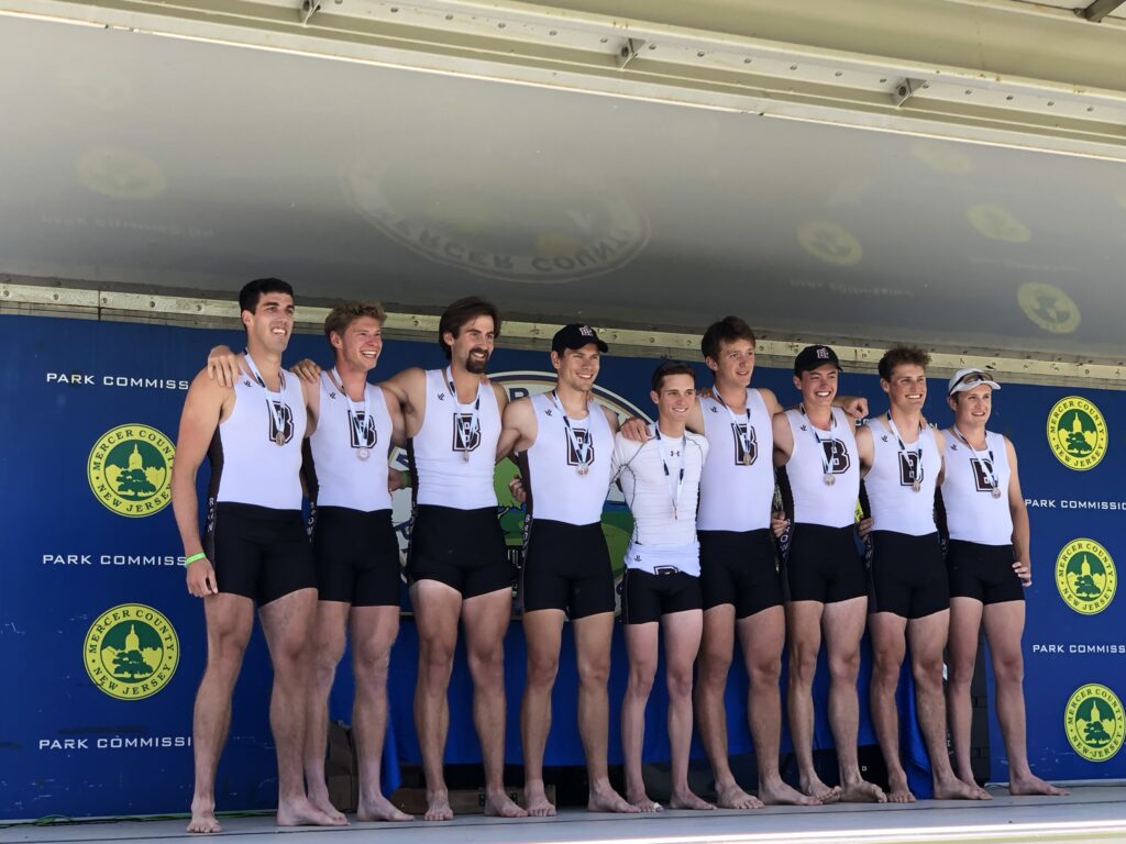 (PHOTO: Rodriguez (far left) being awarded the bronze medal at the 2022 Intercollegiate Rowing Association National Championships.)