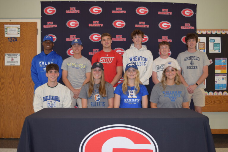 (PHOTO: Rye High School held its NLI (National Letter of Intent) signing ceremony on Thursday, May 23rd, 2024: front row, left to right: Jake Zion, track, Franklin & Marshall College; Jessica Bourne, cross country track, Gettysburg College; Isabel Harvey, soccer, Hamilton College; Sydney Jones, rowing, Wellesley College back row, left to right: Ameer White, football, Colby College; Dillon Schmidt, baseball, Hamilton College; Koen Terlouw, football, Sacred Heart University; Charlie Margiloff, soccer, Wheaton College; Ollie Lincoln, soccer, Hartwick College; Max Crothall, soccer, SUNY Geneseo. Not pictured: Joe Chai, lacrosse, Oberlin College.)