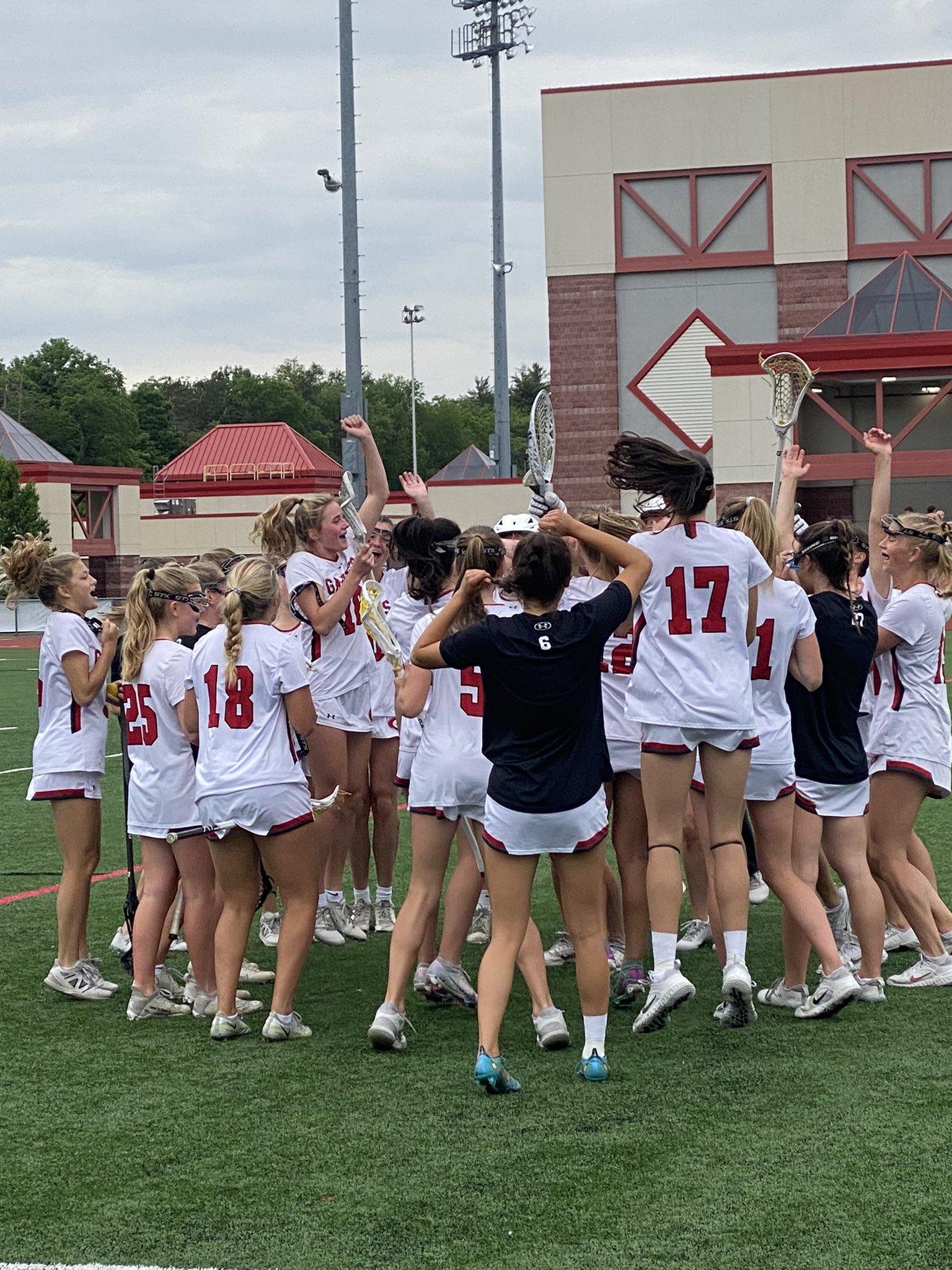 (PHOTO: The Girls Varvist Lacrosse team gets rowdy before their semi-final matchup against Fulton. Rye went on to win, 14-10.)