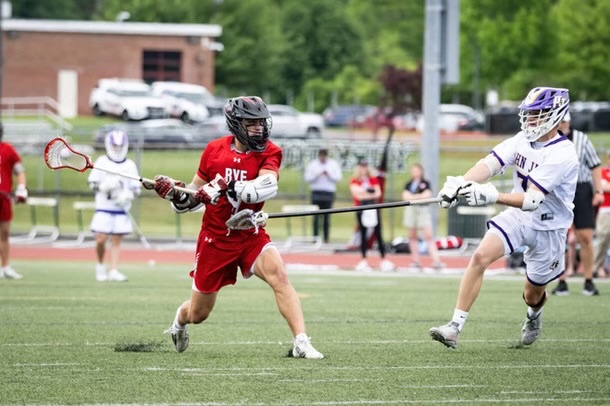 (PHOTO: Rye's Tucker Hess scored five points on Saturday to help the Garnets advance the New York State final four.)