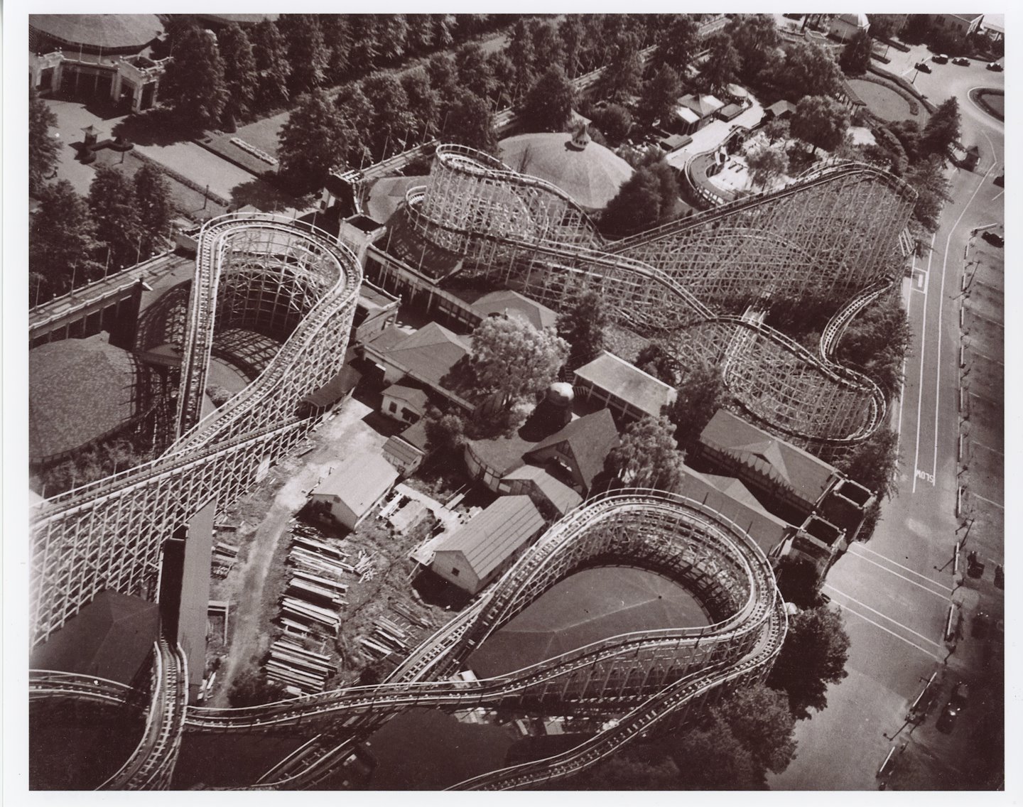 (PHOTO: The Airplane Coaster (top right) side-by-side with the Dragon Coaster (bottom left) in 1948. Photo courtesy of Rye Historical Society, taken by George Terpin.)