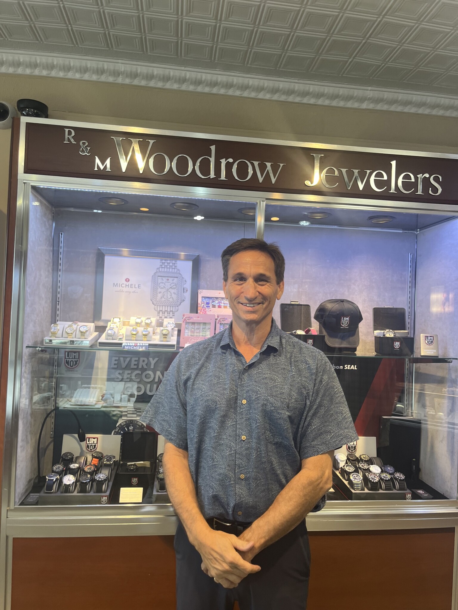 (PHOTO: Michael Woodrow owns and manages R & M Woodrow Jewelers.)