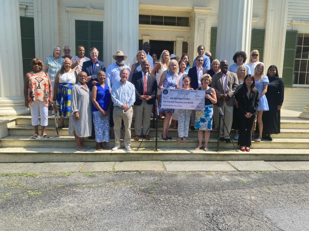 (PHOTO: Jay Heritage Center staff and partners gathered on Tuesday to celebrate their largest state donation since 2014.)