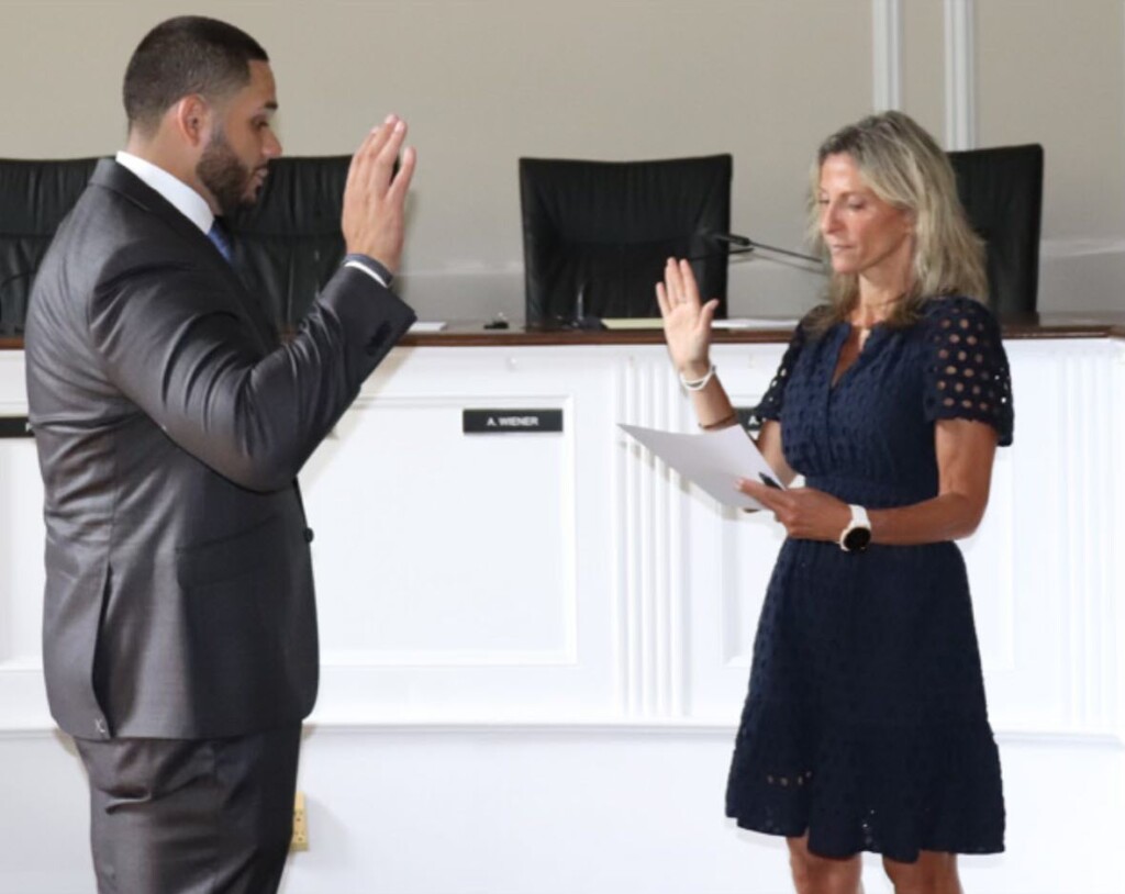 (PHOTO: Victor Rodriguez was sworn in as a new City of Rye police officer by City Clerk Noga Ruttenberg in a City Hall ceremony on July 22, 2024.)