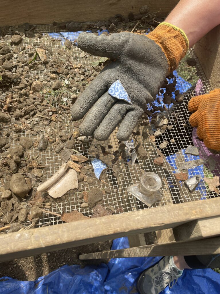 (PHOTO: Pieces of pottery and glass uncovered at the William Voris archaeological dig at The Bird Homestead and Meeting House Conservancy on Monday, July 29, 2024.)