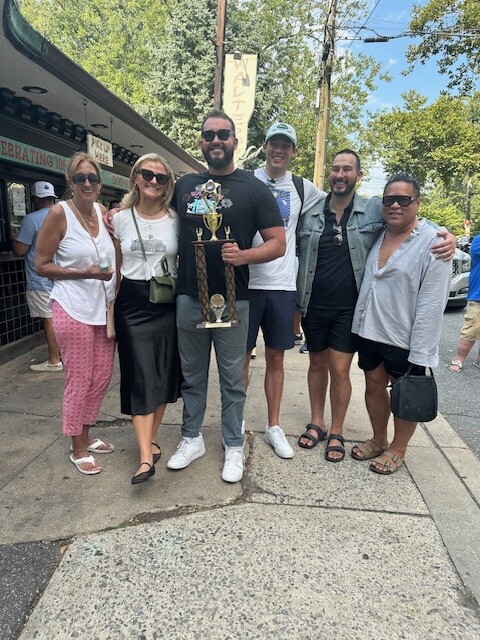 (PHOTO: With family, friends and fiancés: Judy Croughan, Christina Defelice, Walter's Hot Dog Eating Champion Will Croughan, Mark Croughan, Colin Croughan and Anthony Deeying.)