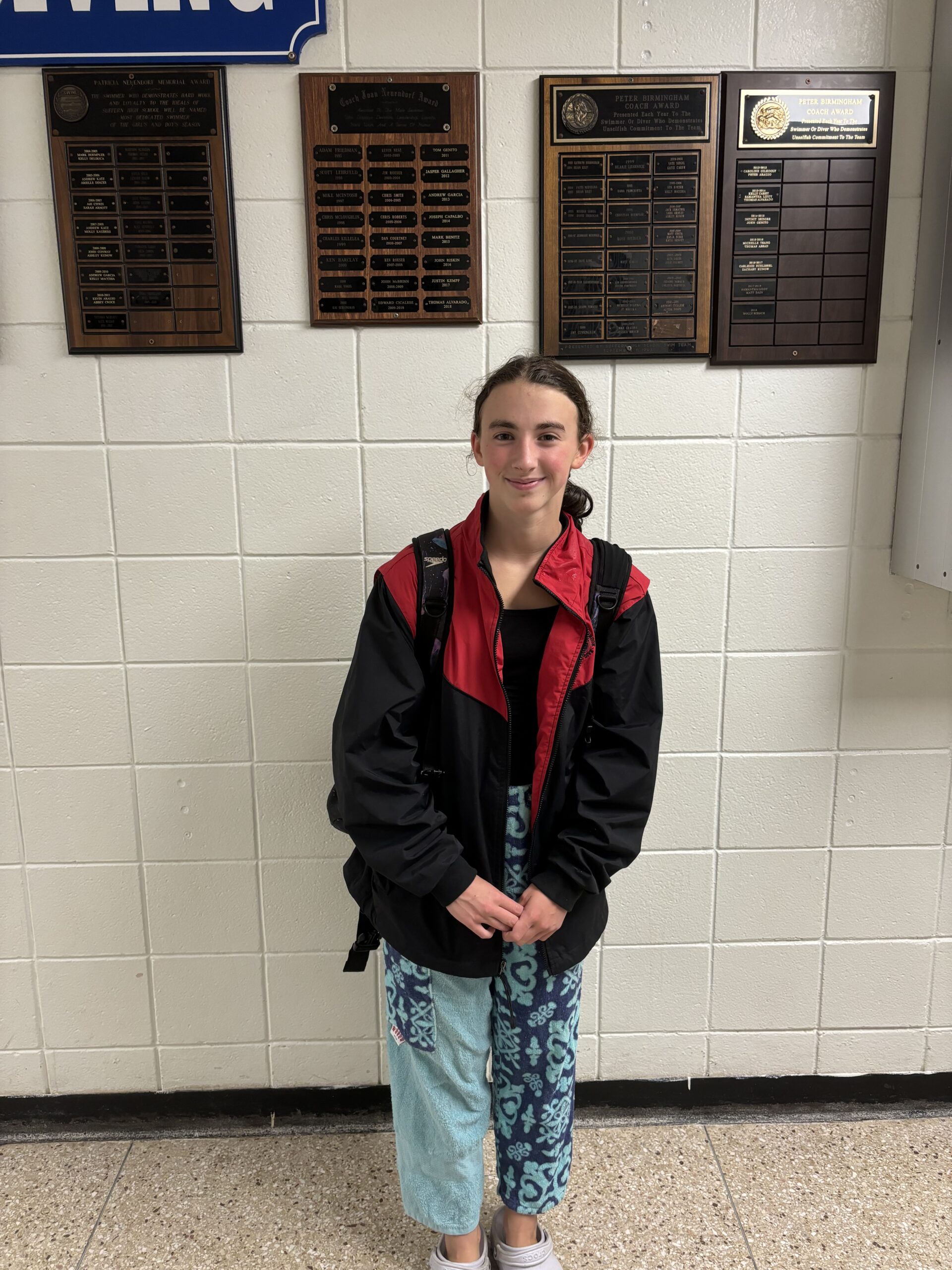 (PHOTO: Rye 8th-Grader Quinn Boyle won the 500M freestyle on Monday against Suffern.)