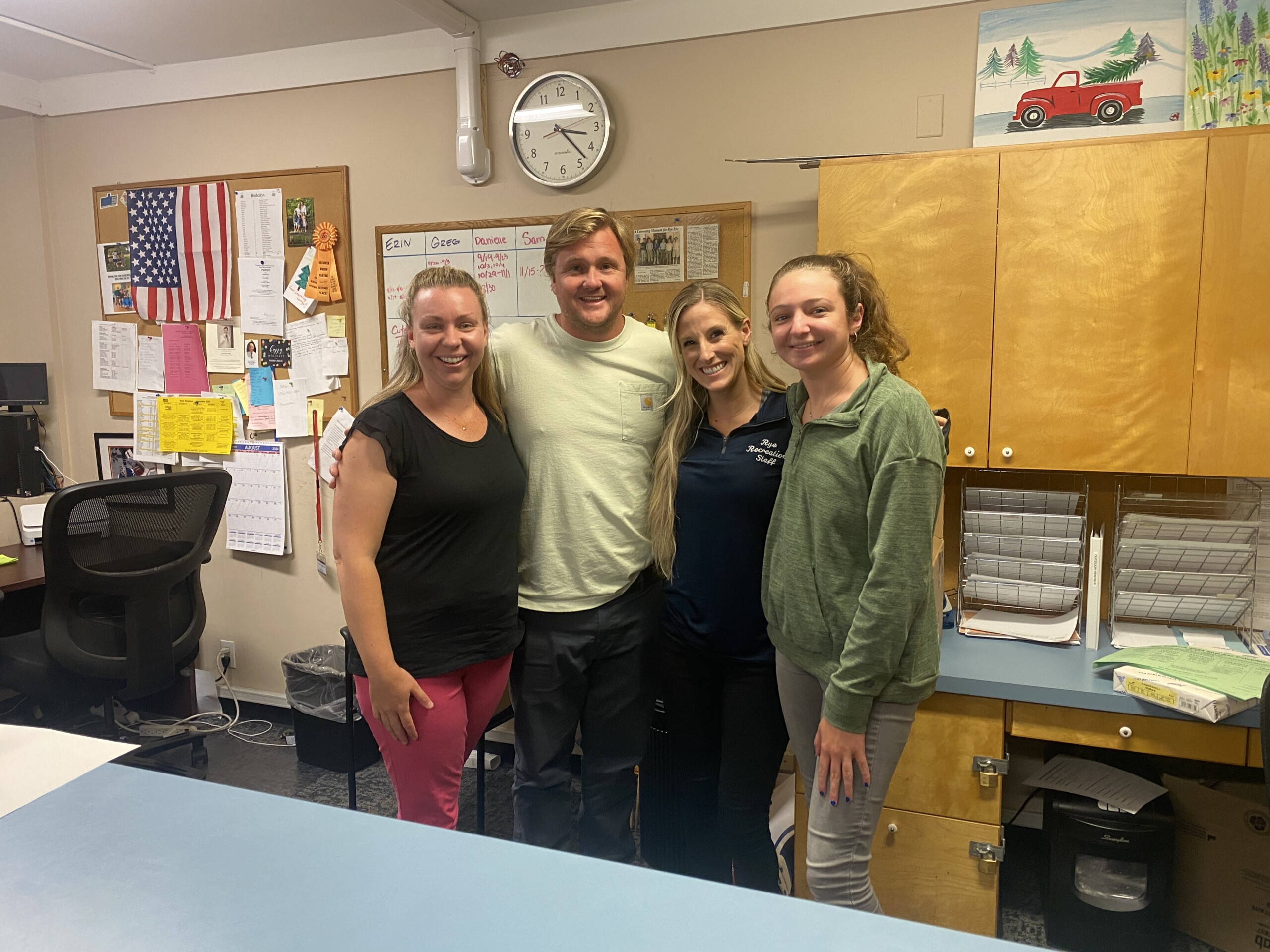 (PHOTO: In the control center (aka Rye Recreation office) on Tuesday, September 3, 2024: Superintendent of Rye Recreation Erin Mantz and her relatively new rec crew of Kevin Thompson (recreation attendant), Danielle Fairweather (assistant superintendent) and Samantha Arone (recreation attendant and registration).)