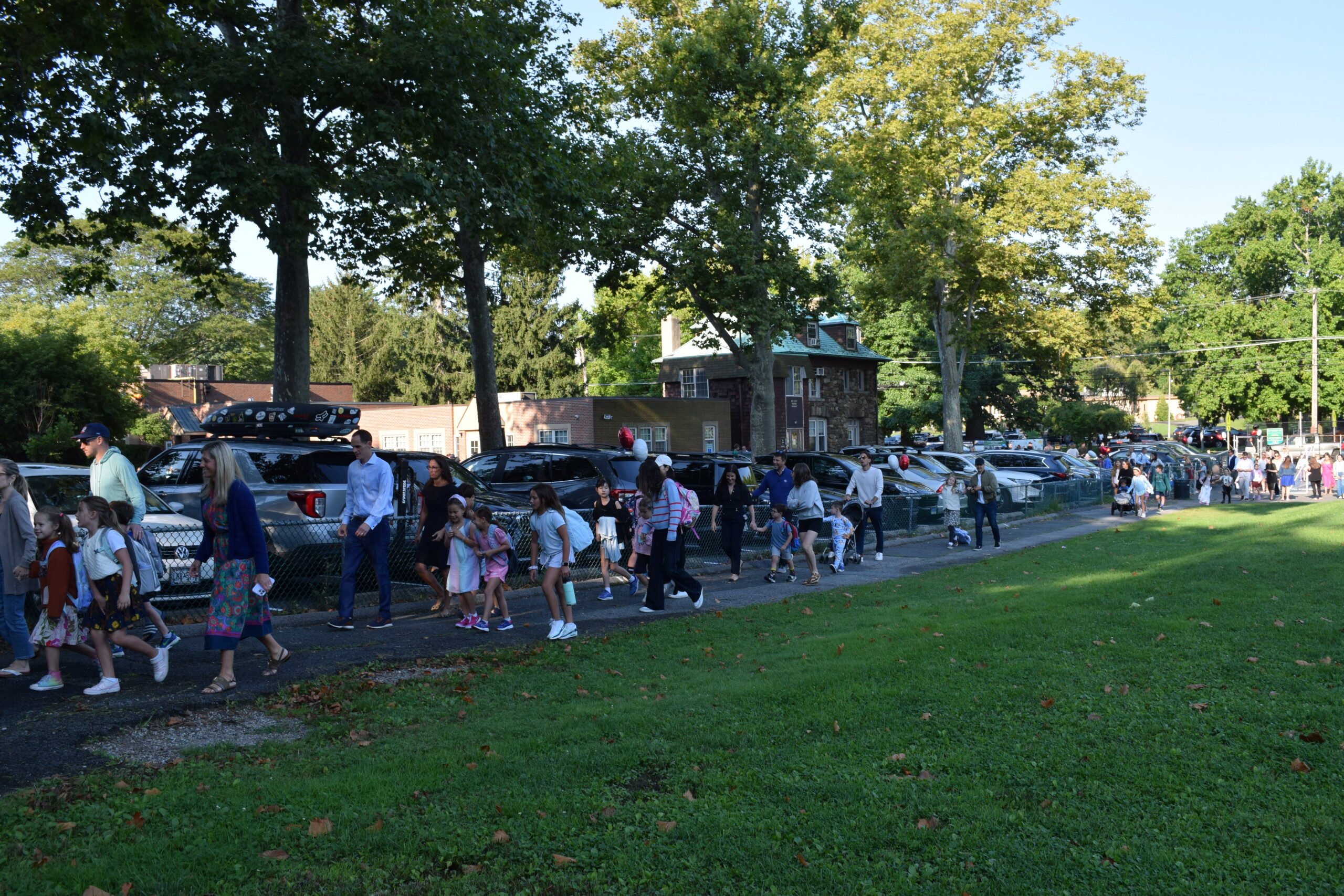 (PHOTO: The first day of school at Midland Elementary School, September 3, 2024 with parents and students lining up.)