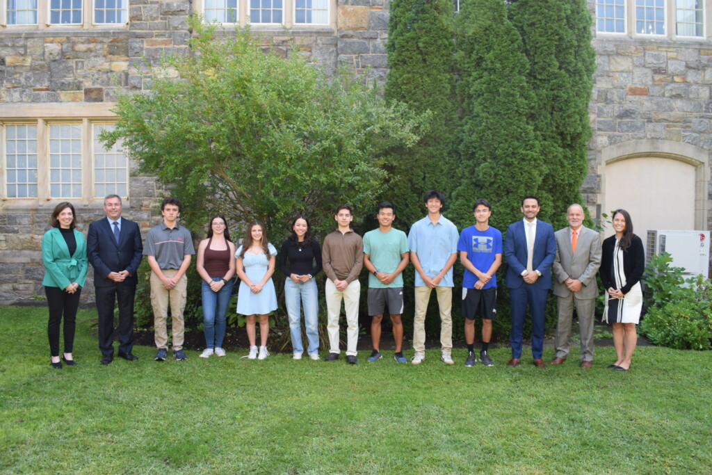 (PHOTO: Rye City School District administrators with the eight Rye High School National Merit Scholarship semi-finalists. Left to right: Director of Pupil Personnel Services and Special Education Dr. Erin Vredenburgh, Superintendent Eric Byrne, Timothy O'Donnell, Andrea Kamander, Haley Kloepfer, Juliet Rotondo, Kiran Gounden-Kobes, Bill Chen, Andrew Chun, Alex Gordon, RHS Principal Andrew Hara, RHS Assistant Principal Mark Bayer, Secondary Pupil Personnel Services Supervisor Amy Osooli.)