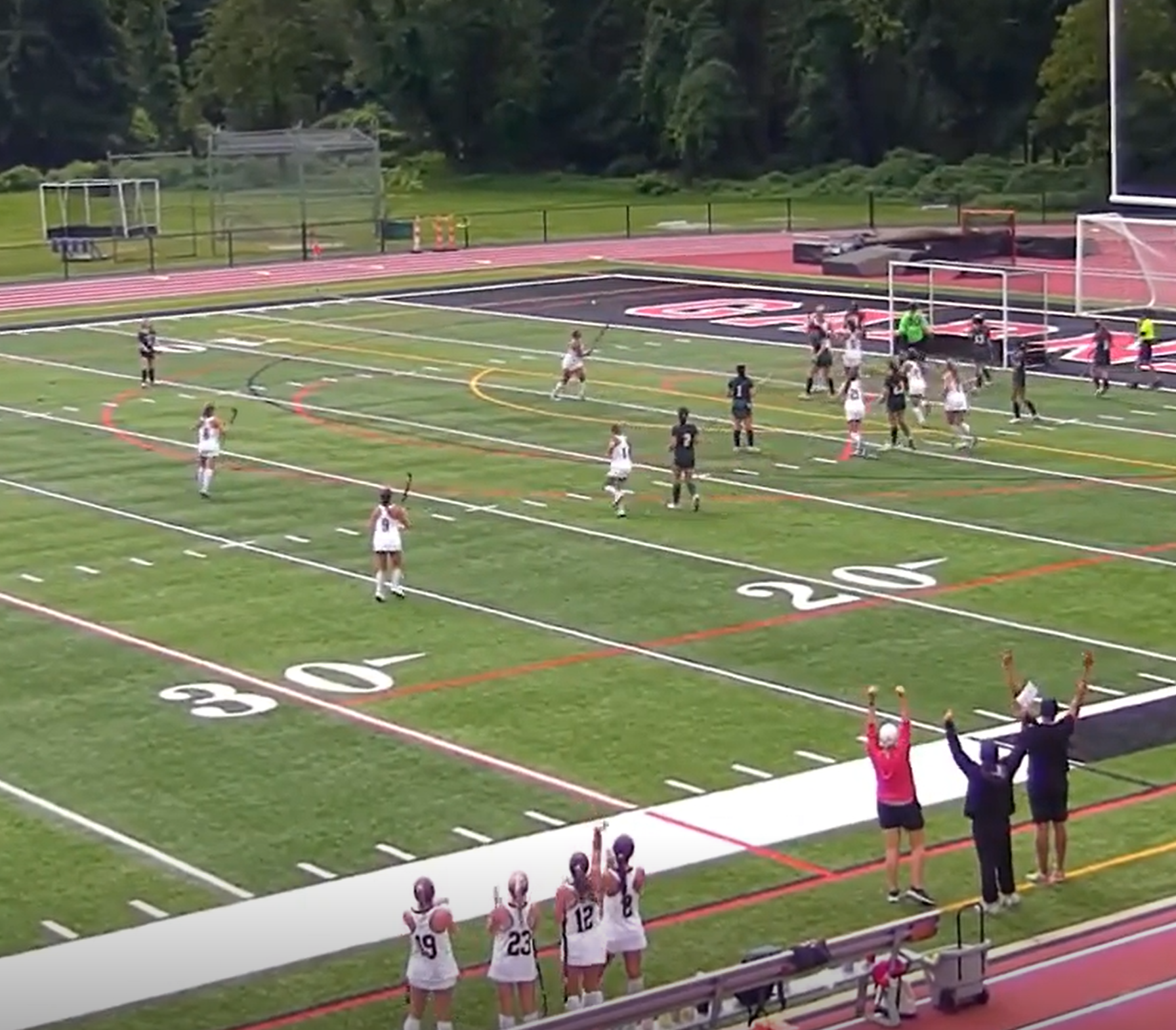 (PHOTO: The Rye sidelines celebrates Beau Whaling's goal against Yorktown, which stood up as the game-winner.)