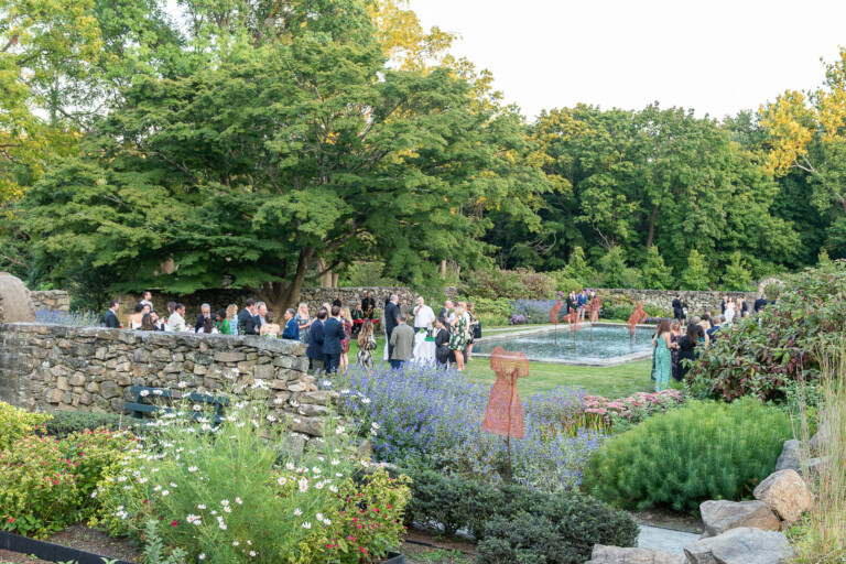 (PHOTO: Jay Soirée attendees enjoyed cocktails in the gardens amidst the new art installation Rich Soil by Kristine Mays. Credit: Kim Crichlow)