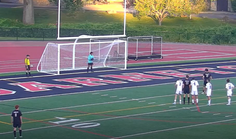 (PHOTO: Rye Boys Soccer's Kaden Zion lines up for a penalty kick, which he buried to give Rye a late lead against Pearl River.)