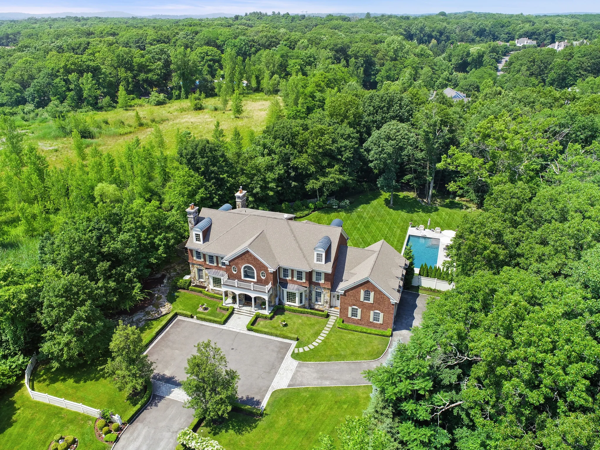 House of the Week: 10K Square Feet & an Indoor Putting Green in West Harrison