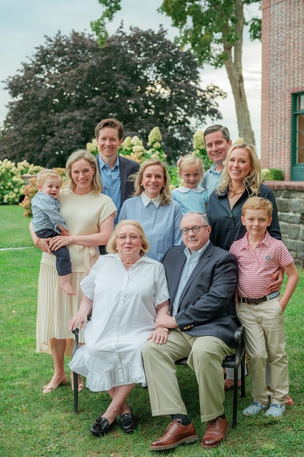 (PHOTO: US Army veteran and Milton Road resident Dennis M. McGuckian with his family in Rye, 2023. His three daughters are in the center of the photo.)