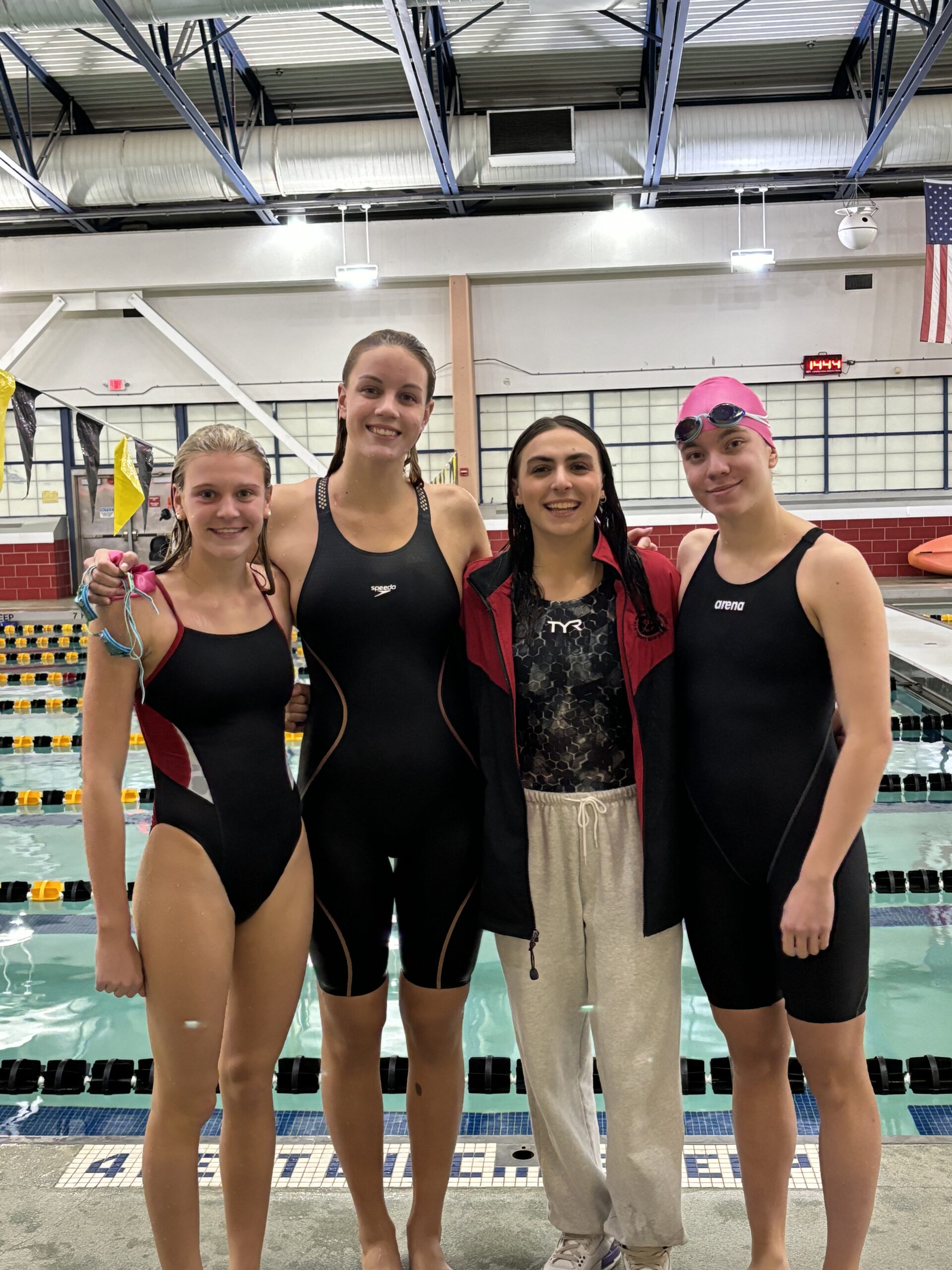 (PHOTO: The 200 Medley Relay Team. L to R: Kate Chesley, Megan Tiedemann, Kayla Lombardo, Grayson Findlay.)