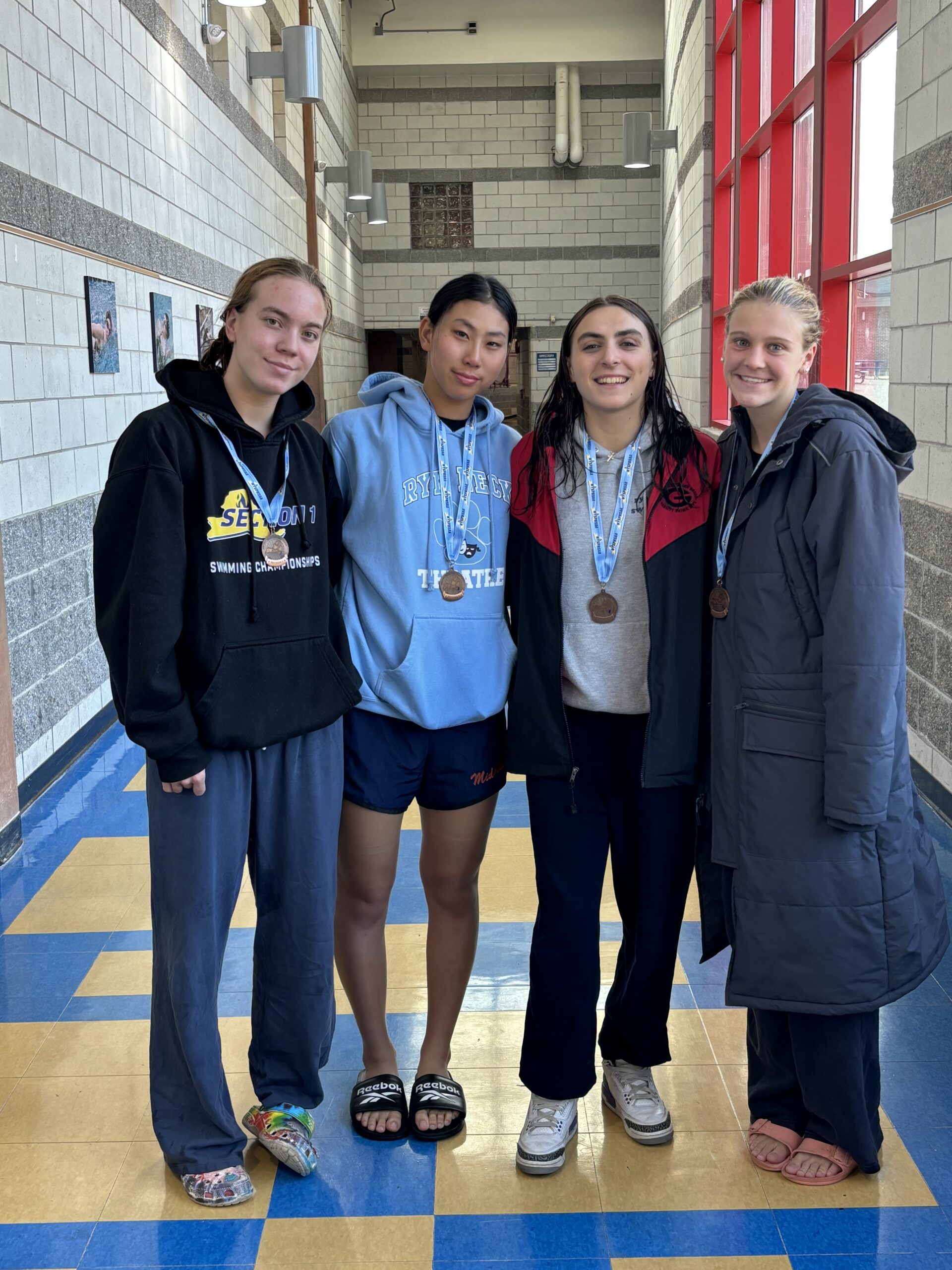 (PHOTO: The 400M freestyle relay team. L to R: Grayson Findlay, Ayana Ite, Kayla Lombardo, Kate Chesley)