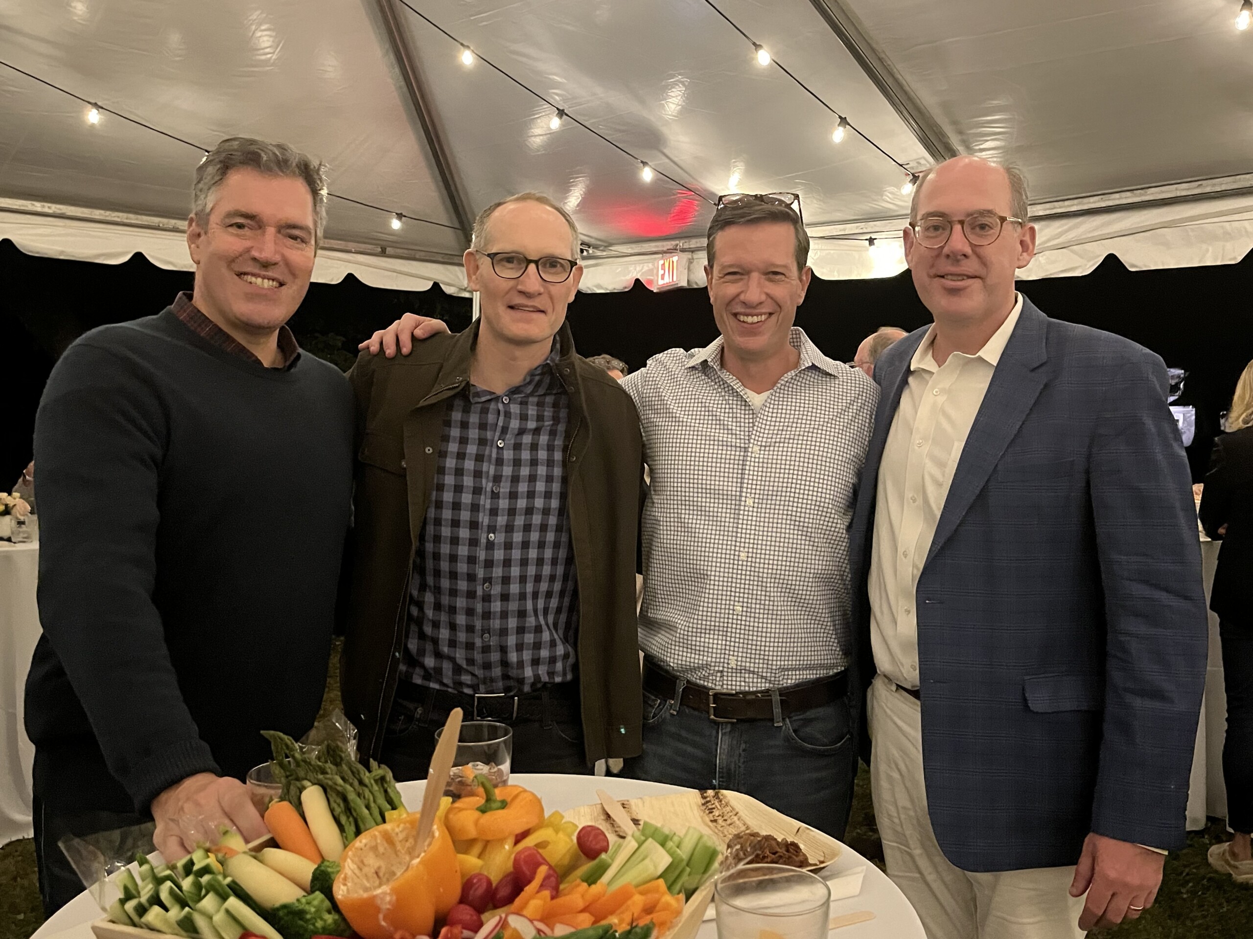 (PHOTO: The Rye Historical Society raised over $30,000 to preserve its Knapp House property at its Annual Fall Food and Whiskey Bash on Saturday, October 5, 2024. RHS Board members Andrew Padovano (third from left) and Jim Beha (far right) with their guests. Contributed.)