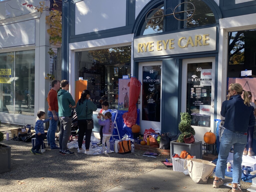 (PHOTO: The 71st annual 2024 Halloween window painting in downtown Rye on October 20, 2024.)