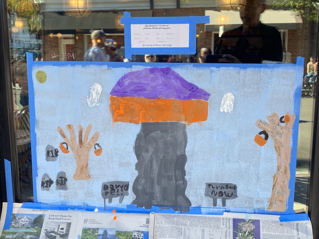 (PHOTO: The 71st annual 2024 Halloween window painting in downtown Rye on October 20, 2024.)