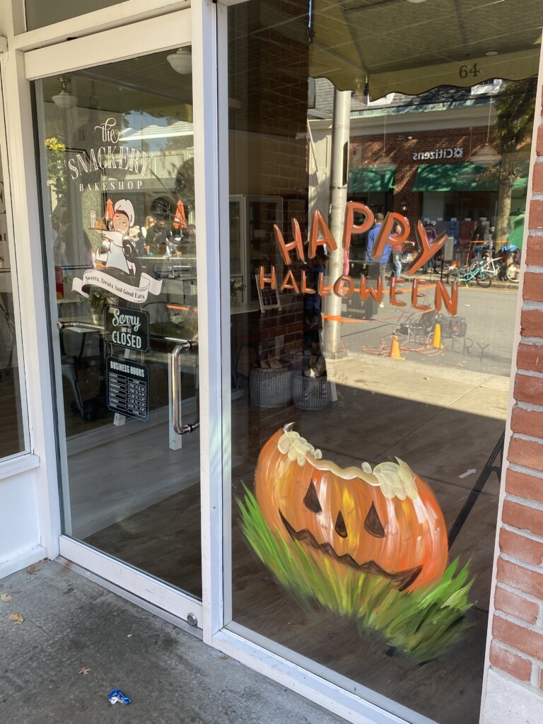 (PHOTO: The 71st annual 2024 Halloween window painting in downtown Rye on October 20, 2024.)