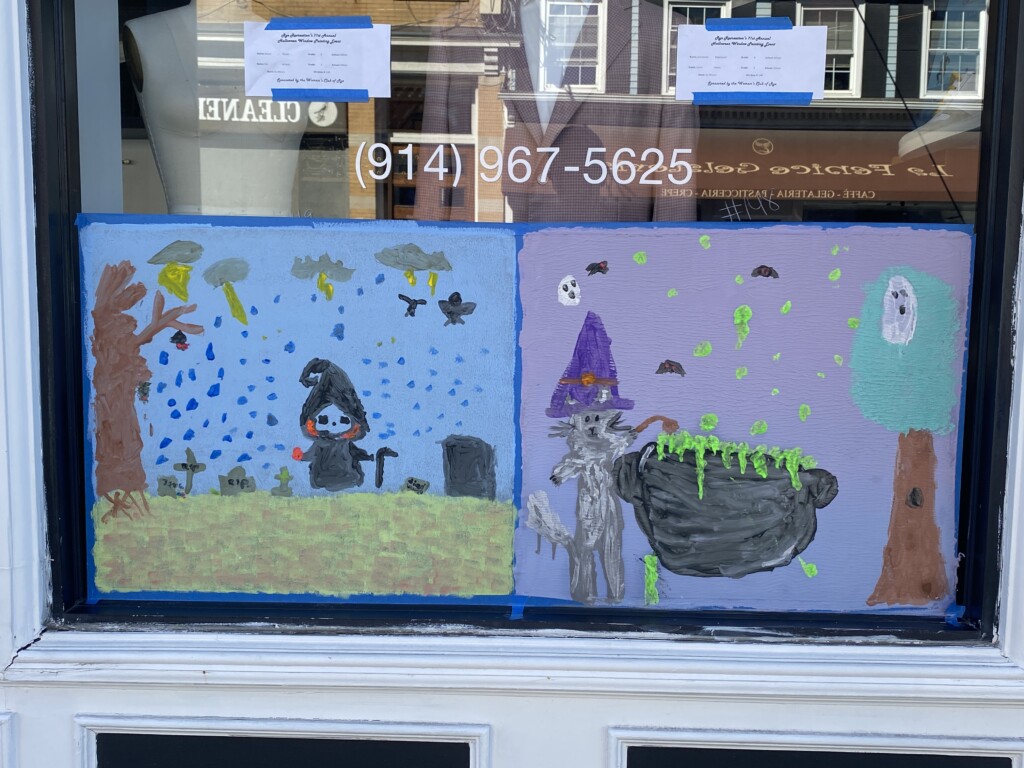 (PHOTO: The 71st annual 2024 Halloween window painting in downtown Rye on October 20, 2024.)