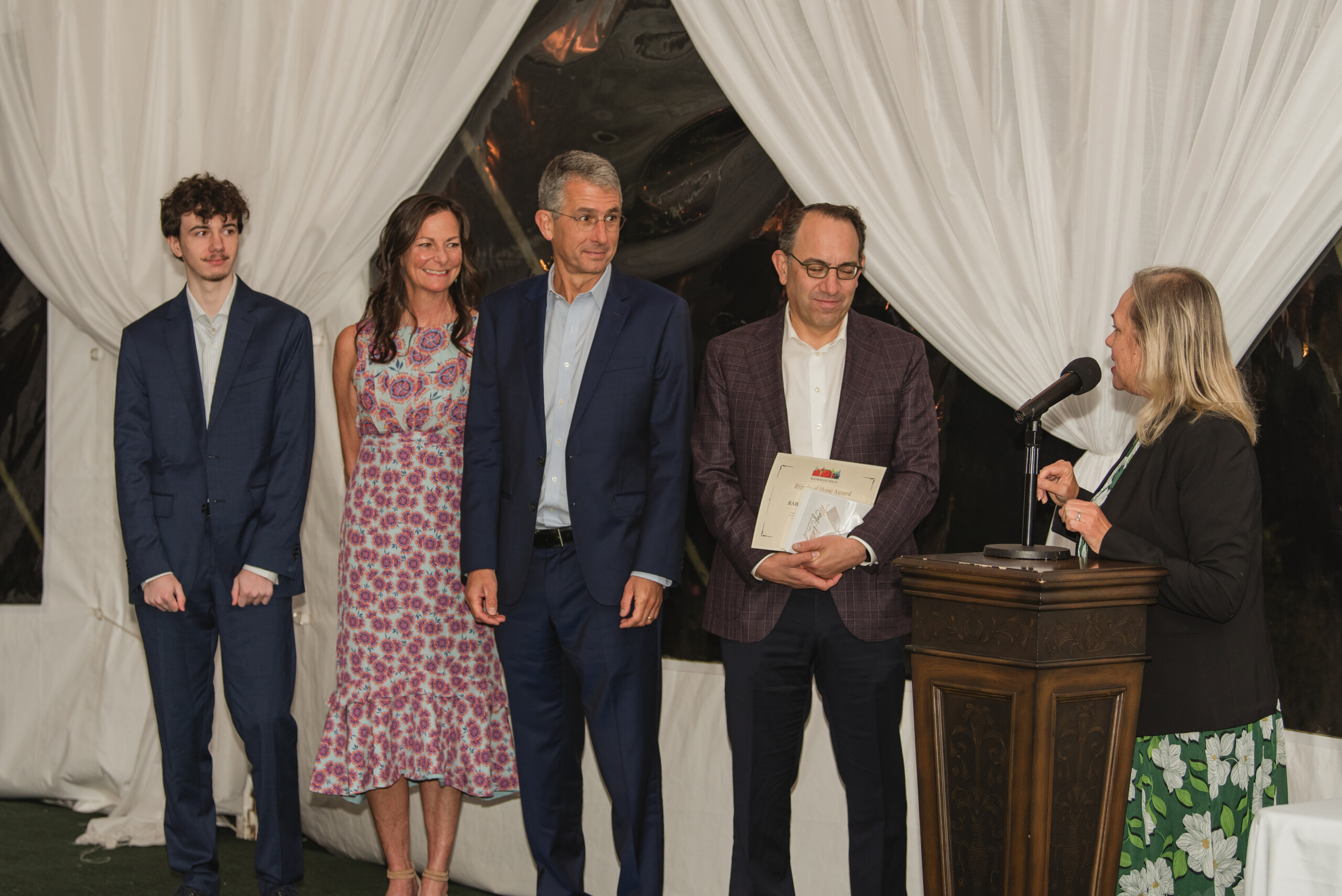 (PHOTO: Ferdinand Coghlan (Rye High School Eagle Scout), Lisa Dominici (executive director, Rye Youth Council), Jay Sears (publisher, MyRye.com), Rabbi Daniel Gropper (Community Synagogue Rye) at the 2024 Wainwright House benefit.)