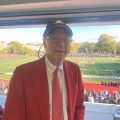 (PHOTO: The voice of Rye Garnet Football and Old Garnet Steve Feeney in the Nugent Stadium press box for the Rye - Harrison game on Saturday, October 26, 2024.)