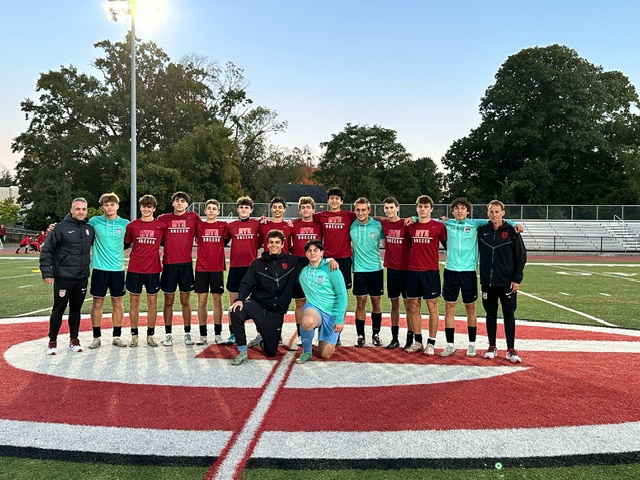 (PHOTO: The Rye Boys Varsity Soccer senior class of 2024 with coaches Jonathan Tuttle and Jared Small. Credit: Daniela Arredondo)