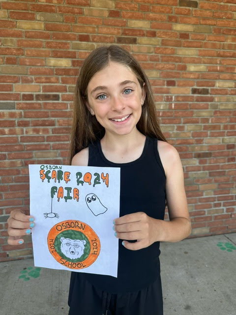 (PHOTO: Osborn 5th grader Natasha Nikolic will have her design on the 2024 Scare Fair T-Shirt that all Osborn students receive during the week of the fair. Contributed.)