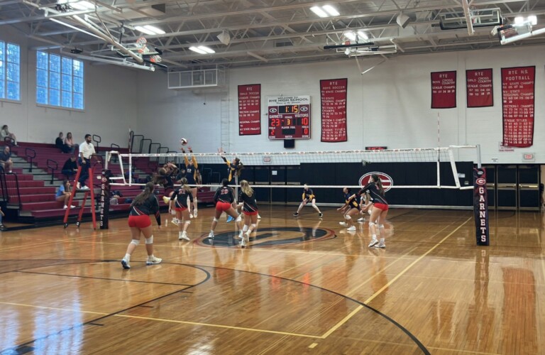 (PHOTO: Rye defended its home court on Monday evening against Pelham, winning in 3 sets. Credit: Rye Athletics.)